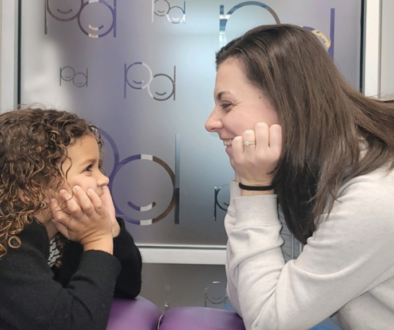 child smiling at dentist