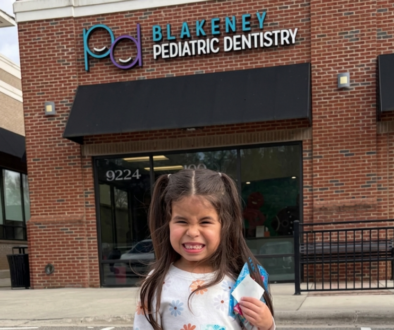 Happy child leaving dental office